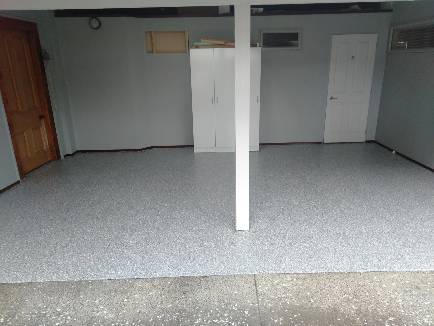 Salt and pepper flake garage floor in Arkles Bay