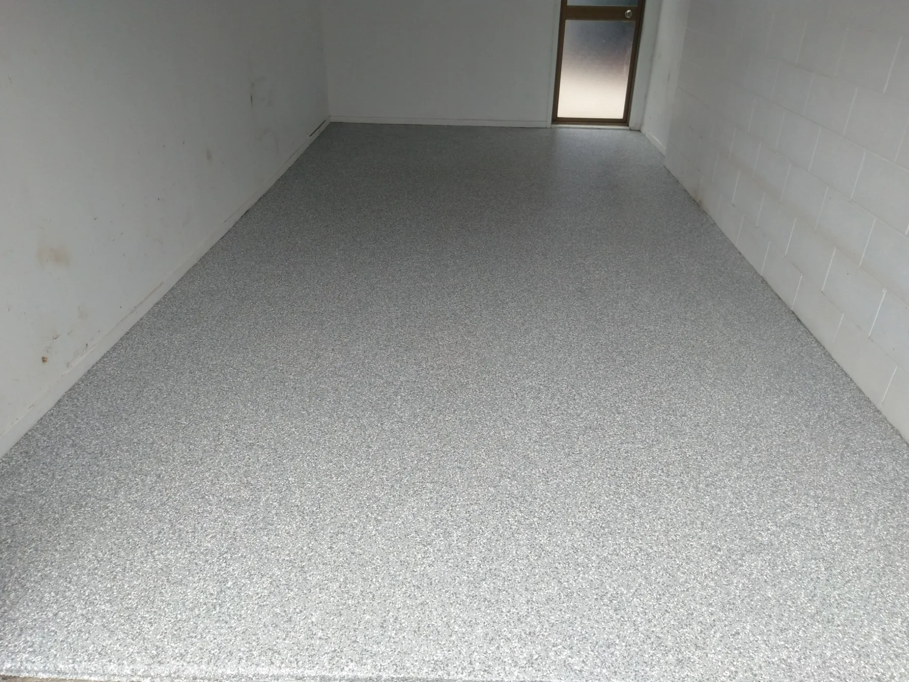 Light grey decorative flake garage floor
